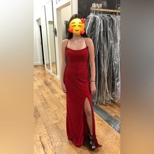 Red beaded lace up back prom dress